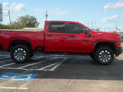 Pre-Owned Red Hot 2025 Chevrolet Silverado 2500HD Custom 4WD - photo 4 - Stock #261105B