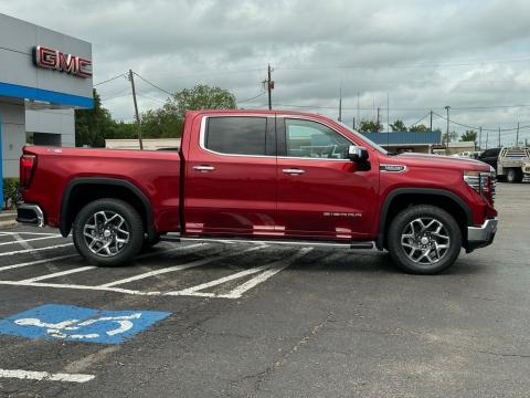 New Volcanic Red Tintcoat 2026 GMC Sierra 1500 SLT 4WD - photo 4 - Stock #260777